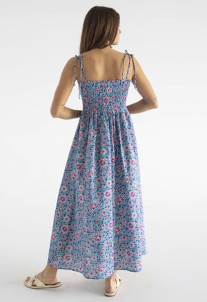 woman in teal floral ruched sundress with spaghetti straps