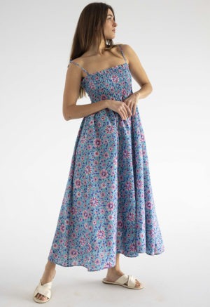 woman in teal floral ruched sundress with spaghetti straps