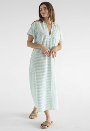woman in green and white stripe kaftan