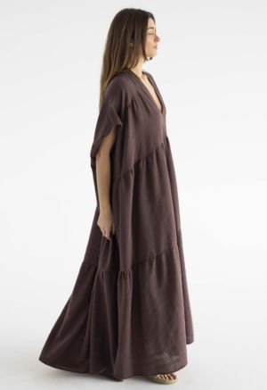 woman in dark brown v-neck maxi tiered dress