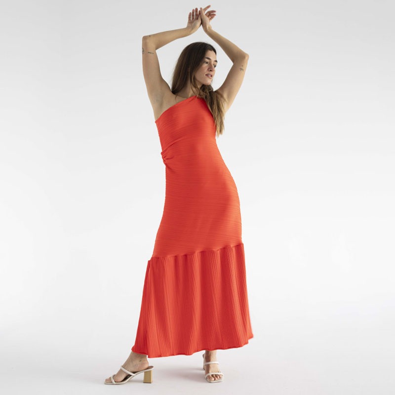woman in red one shoulder maxi dress