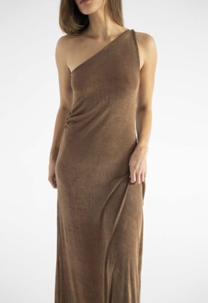 woman in brown slinky one shoulder maxi dress