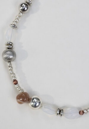 Necklace of silver, white rocks and red rocks