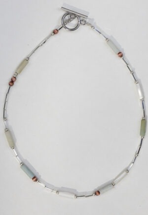 necklace of light green, red and silver beads