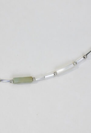 necklace of light green, red and silver beads