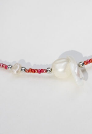 red and pearl necklace