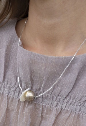 woman wearing necklace