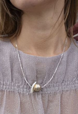 woman wearing necklace