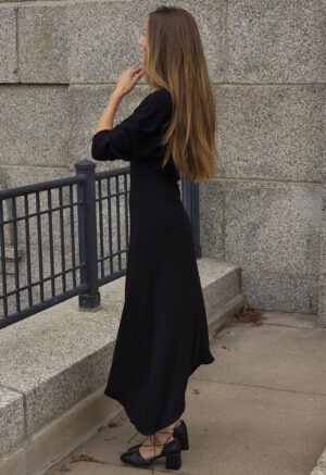 woman in black scoop midi dress