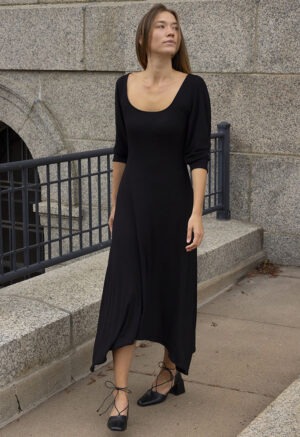 woman in black scoop midi dress