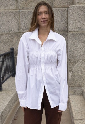 woman in white button-up