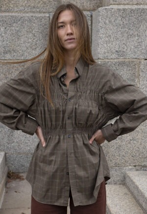 woman in plaid button-up
