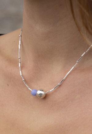 woman wearing necklace