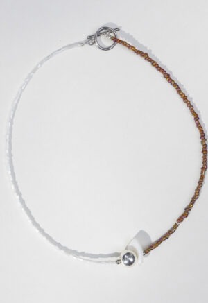 half white half brown necklace